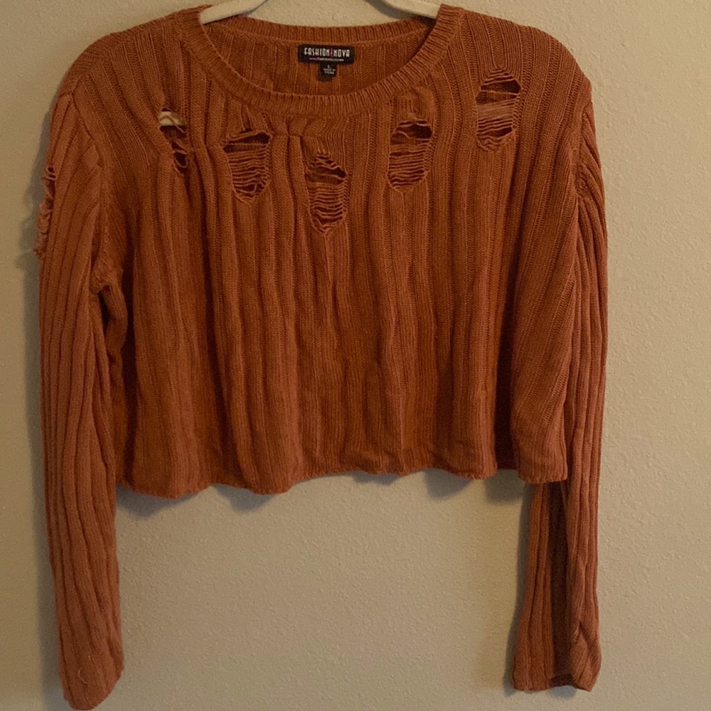 A distressed crop top for the fall season